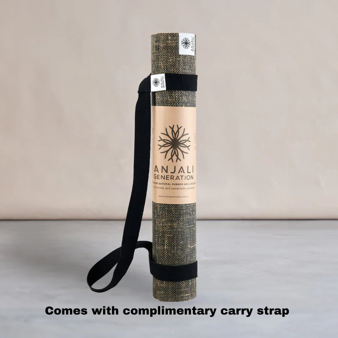 Anjali Generation natural jute eco friendly yoga mat with a carrying strap on a neutral background