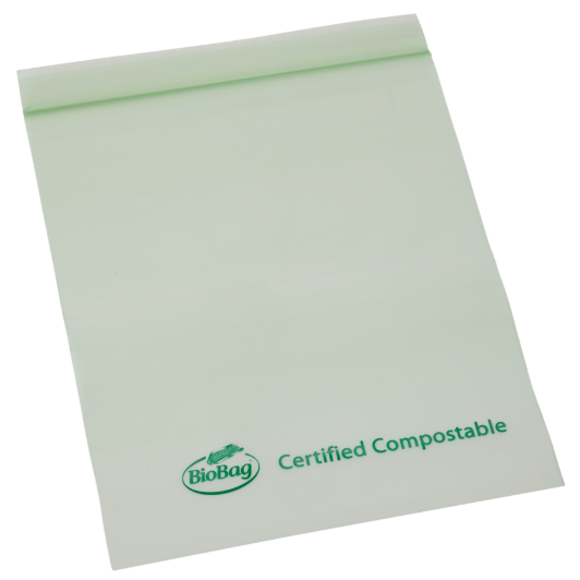 Green compostable bag with 'BioBag' certified compostable logo on a white background