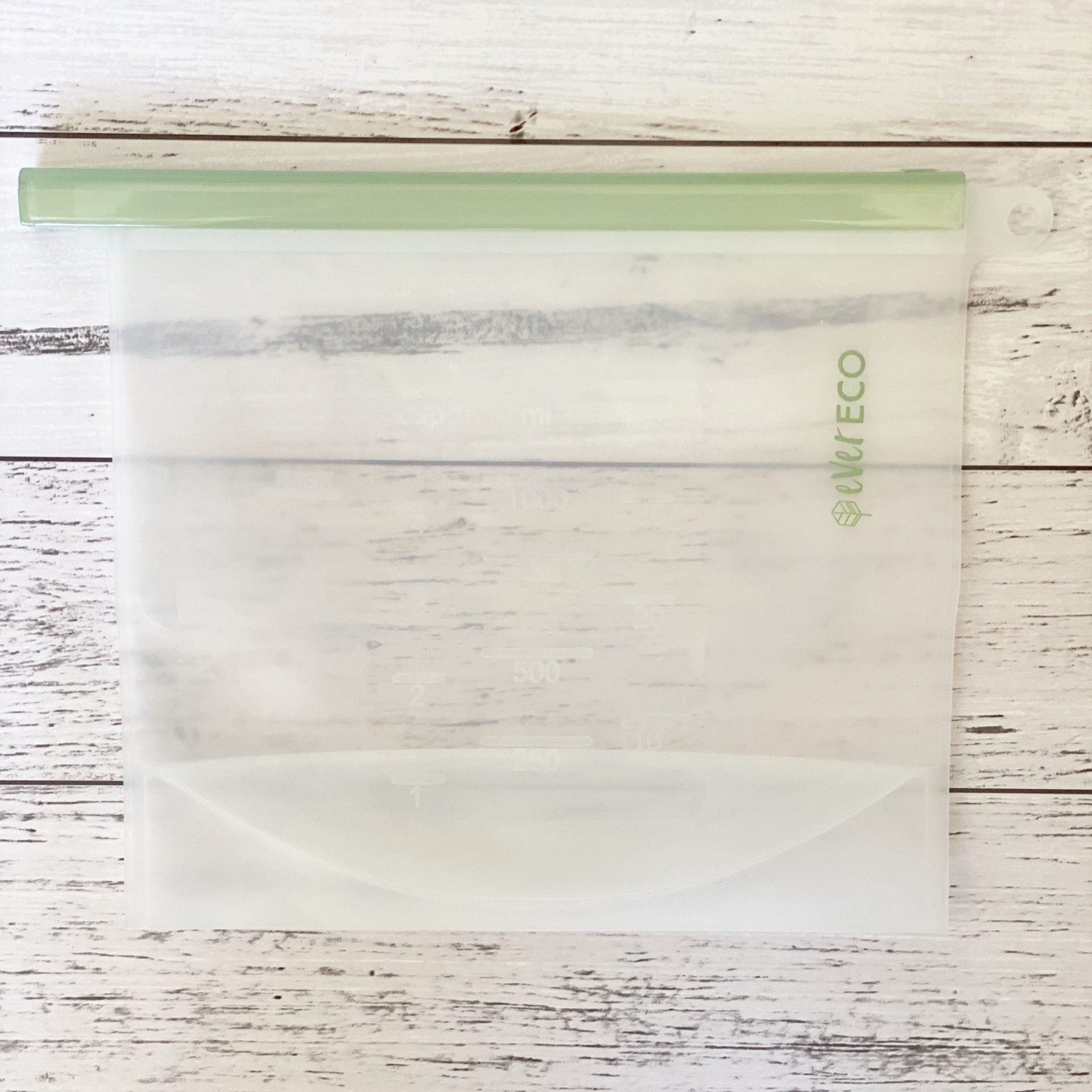 Ever Eco Reusable silicone food storage bag with a visible brand logo on a wooden surface