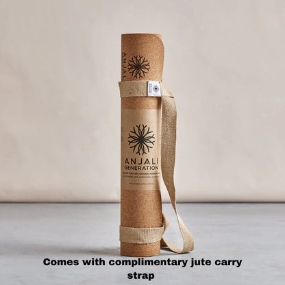 Anjali Generation luxury cork yoga mat with a jute carry strap on a neutral background