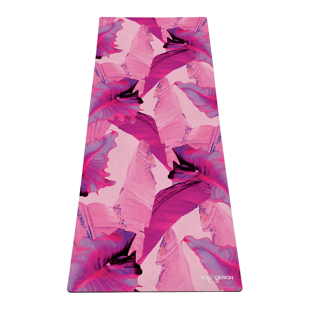 Yoga Design Lab combo mat with pink and purple floral design on a white background